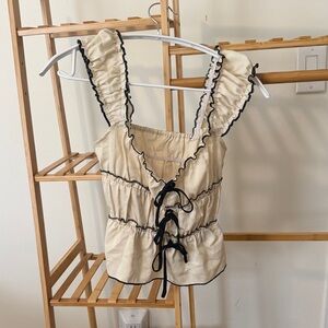 Ruffled Cream Top with Black Trim